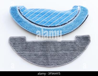 Two clean blue and grey microfiber mop pads on white background Stock Photo