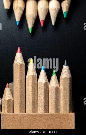 Creative business growth concept showing wooden pencils forming a rising bar chart Stock Photo