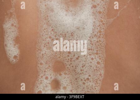 Close Up of Bath Foam on Skin During Bathing Stock Photo