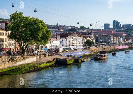View of Gaia Cable Car (Teleférico de Gaia) and Vila Nova de Gaia waterfront in Portugal, Southwestern Europe Stock Photo