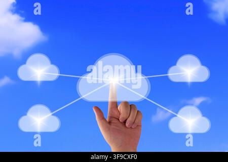 Conceptual image of a businessman hand touching virtual cloud storage network system. Global data synchronization, connection technology, and cyber se Stock Photo