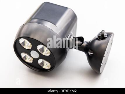 This black LED security light has a motion sensor Stock Photo
