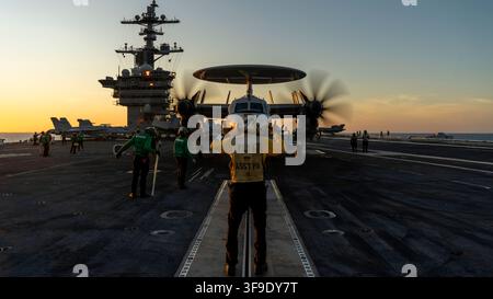 An E-2D Hawkeye, attached to Carrier Airborne Early Warning Squadron (VAW) 125, prepares to take off from the flight deck of Nimitz-class aircraft carrier USS George Washington (CVN 73) while underway in the Timor Sea in support of Talisman Sabre 2025, July 14, 2025. Talisman Sabre is the largest bilateral military exercise between Australia and the United States advancing a free and open Indo-Pacific by strengthening relationships and interoperability among key allies and partners, while enhancing our collective capabilities to respond to a wide array of potential security concerns. (U.S. Nav Stock Photo