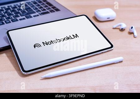 NotebookLM AI app logo on an Apple iPad screen. Stock Photo