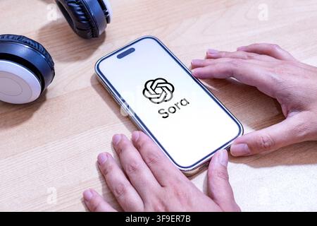 Open AI Sora app logo on an Apple iPhone screen. Stock Photo
