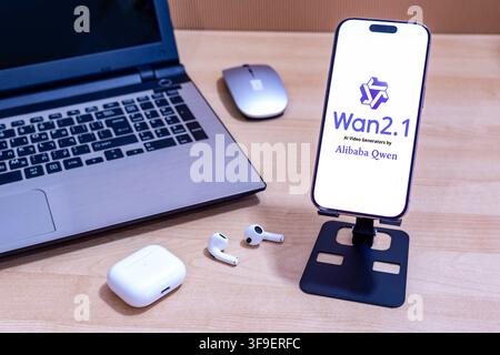 Wan 2.1 AI logo on an Apple iPhone screen. Stock Photo