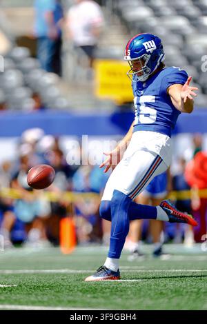 New York Giants punter Jordan Stout (15) punts against the Houston ...