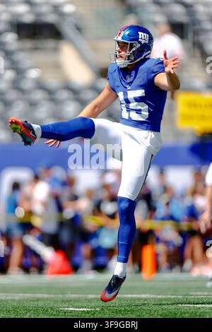 New York Giants punter Jordan Stout, left, left, and Jermaine Eluemunor ...