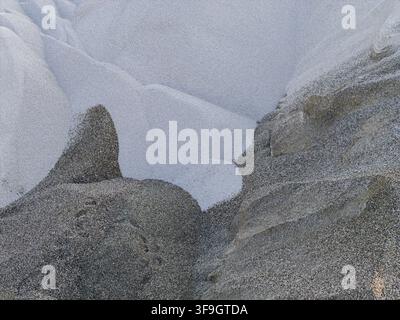 Aerial view of piles of sand and gravel showing contrasting textures and natural patterns in Poland. Stock Photo