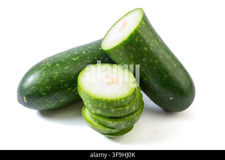 Whole and Sliced Small Green Wax Gourd Isolated on White Stock Photo