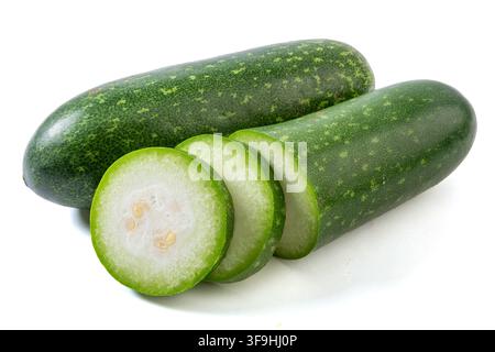 Whole and Sliced Small Green Wax Gourd Isolated on White Stock Photo