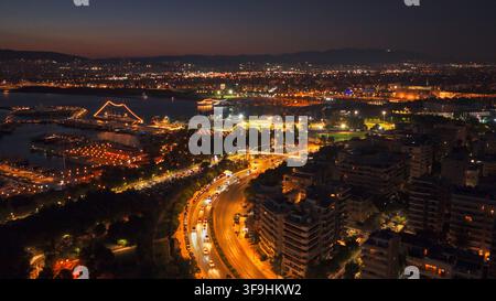 Aerial view of the illuminated coastline and city lights of Antibes at ...