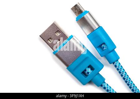 USB and Micro USB connectors on a white background. Close-up of blue connectors. Stock Photo