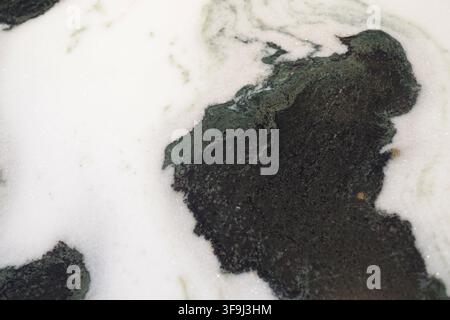 Marble surface with dark and light patterns in close detail Stock Photo