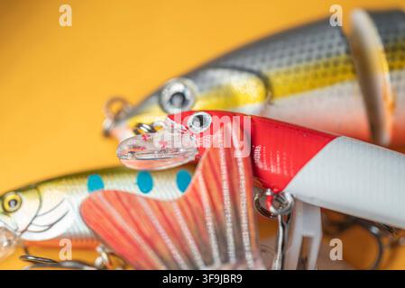 Selective focus on the head and eye of a red fishing lure for freshwater angling Stock Photo