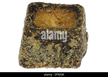 cane sugar jaggery cube isolated on white background Stock Photo