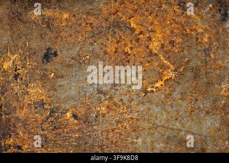 Detailed macro photograph of a heavily rusted metal surface. Intricate texture showcases corrosion patterns with shades of orange, brown, and grey. Stock Photo