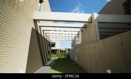 Modern concrete and brick architecture creating an outdoor space with pergolas, geometric shadows, and green grass Stock Photo