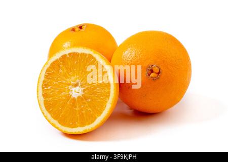 Fresh Navel Oranges Whole and Halved Showing Pulp Stock Photo