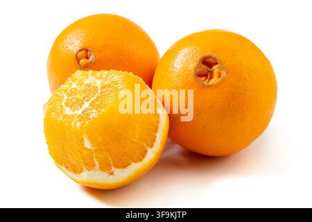 Fresh Navel Oranges Whole and Halved Showing Pulp Stock Photo