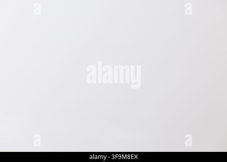 Minimalist plain off-white smooth background texture, light grey neutral clean surface backdrop for copy space, product display, advertising presentat Stock Photo