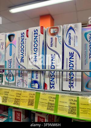 26.07.2026 Ukraine, Kharkov Sensodyne Toothpaste Boxes Displayed on Supermarket Shelf Stock Photo
