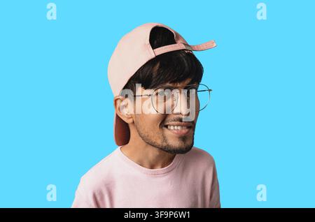 Smiling Young Man Wearing Cap And Glasses, Close Up Portrait, Creative Concept Stock Photo