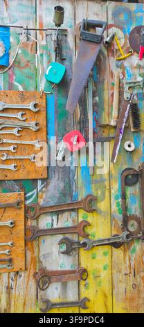 Old tools on colorful wooden boards Stock Photo