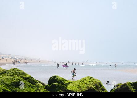 Tourists bathing in the Atlantic Ocean at Lacanau in southwestern France Stock Photo