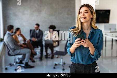 Group of business professionals having a meeting to discuss ideas and solutions for finance company Stock Photo