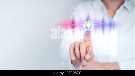 Business user interacting with AI voice assistant interface featuring speech recognition, natural language processing, large language model, voice com Stock Photo