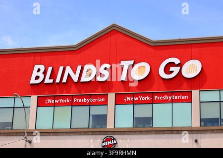 Signage for a Blinds To Go custom window shades and window treatment retailer in Brooklyn, New York. Stock Photo