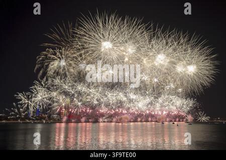 Fantastic fireworks lighting up the sky as part of 50th Golden Jubilee UAE National Day celebrations in Abu Dhabi, UAE. Stock Photo