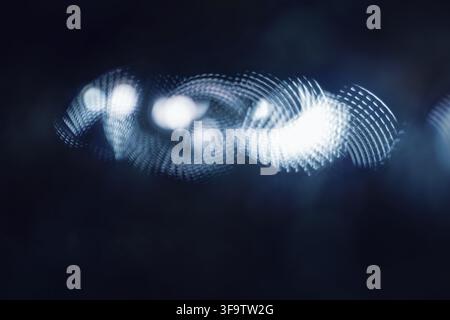 Abstract Light Patterns in Dark Background Featuring Bokeh and Motion Blur Stock Photo
