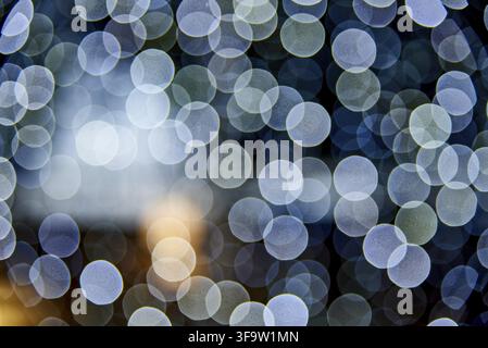 Bokeh abstract texture. Defocused background. Blurred bright light. Circular points Stock Photo