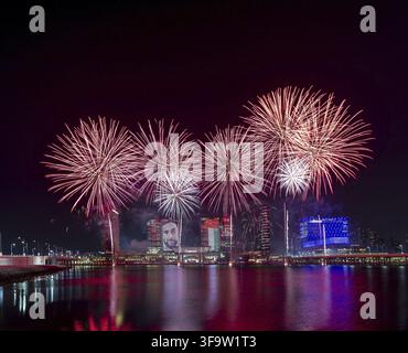 Abu Dhabi, UAE - December 3, 2021: Fireworks lighting up the sky above Galleria Mall as part of 50th Golden Jubilee UAE National Day celebrations in A Stock Photo