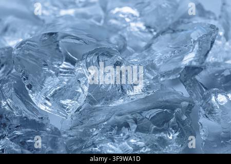 Close-up of Transparent Ice Blocks with Intricate Patterns in Cool Blue Tones Stock Photo