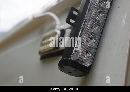 A led light vehicle light emergency light auxiliary light lighting led light illuminates vehicle interior with compact emergency fixture, emphasizing Stock Photo