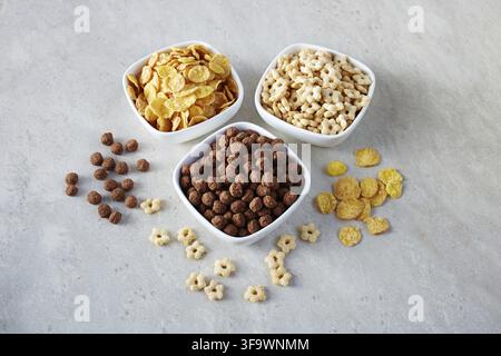 Breakfast cereals in bowls on a light background. Stock Photo