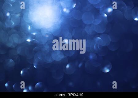 Abstract Blue Bokeh Background with Soft Focus Lights and Glittering Circles Stock Photo