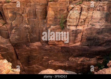 Looking down at a weathered red rock canyon Stock Photo