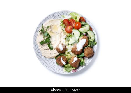 Falafel with hummus and fresh salad isolated on white background Stock Photo