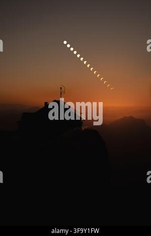 COMPOSITE FOTO - Ein zusammengesetztes Bild aus mehreren Einzelaufnahmen während der partiellen Sonnenfinsternis in Österreich. Aufgenommen und beobachtet vom Schafberg in Salzburg, Österreich. 12. August 2026. // COMPOSITE PHOTO - A composite image taken from several individual photographs during the partial solar eclipse, observed from Schafberg in Salzburg, Austria. August 12, 2026. Stock Photo