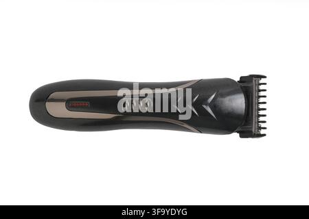 Modern electric hair trimmer and clipper isolated horizontally on clear white background Stock Photo