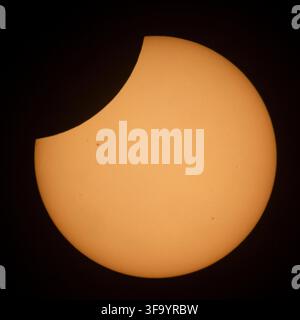 Hodgdon, United States. 12 August, 2026. The Moon is seen passing in front of the Sun during a partial solar eclipse, August 12, 2026 from Hodgdon, Maine, USA. A total solar eclipse swept across parts of Greenland, Iceland, northern Russia, the Atlantic Ocean, Spain, and a small corner of Portugal. A partial eclipse was visible in parts of the U.S., most of Canada, much of Europe, and northwest Africa. Credit: Joel Kowsky/NASA/Ģ����ý Live News Stock Photo