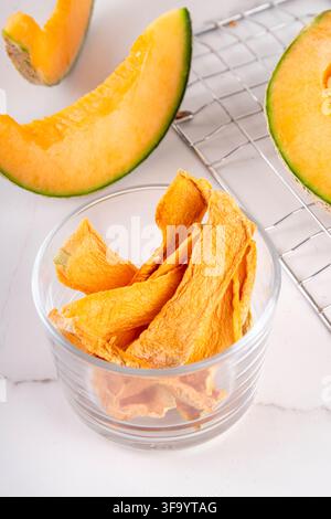 Ripe Yellow Melon Dried Jerky, Homemade  Air Fryer Dehydrated Melon slices, Raw Vegan Chewy Yellow Melons Candy, healthy fruit alternative for traditi Stock Photo