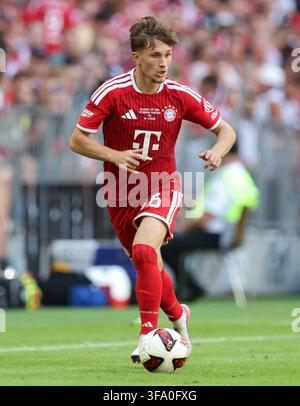 Tim Binder (FC Bayern Munich), action, duel against Anselmo Garcia Mac ...
