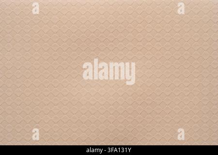 Soft beige paper texture featuring a subtle geometric diamond pattern. Elegant abstract background with gentle tonal variation, ideal for wallpaper, s Stock Photo