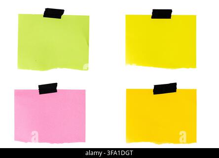 four blank colorful sticky note papers with black adhesive tape cut out. template mockup Stock Photo
