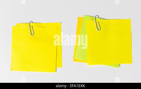 Set of two blank sticky notes with paper clips isolated on white background. Template mockup Stock Photo